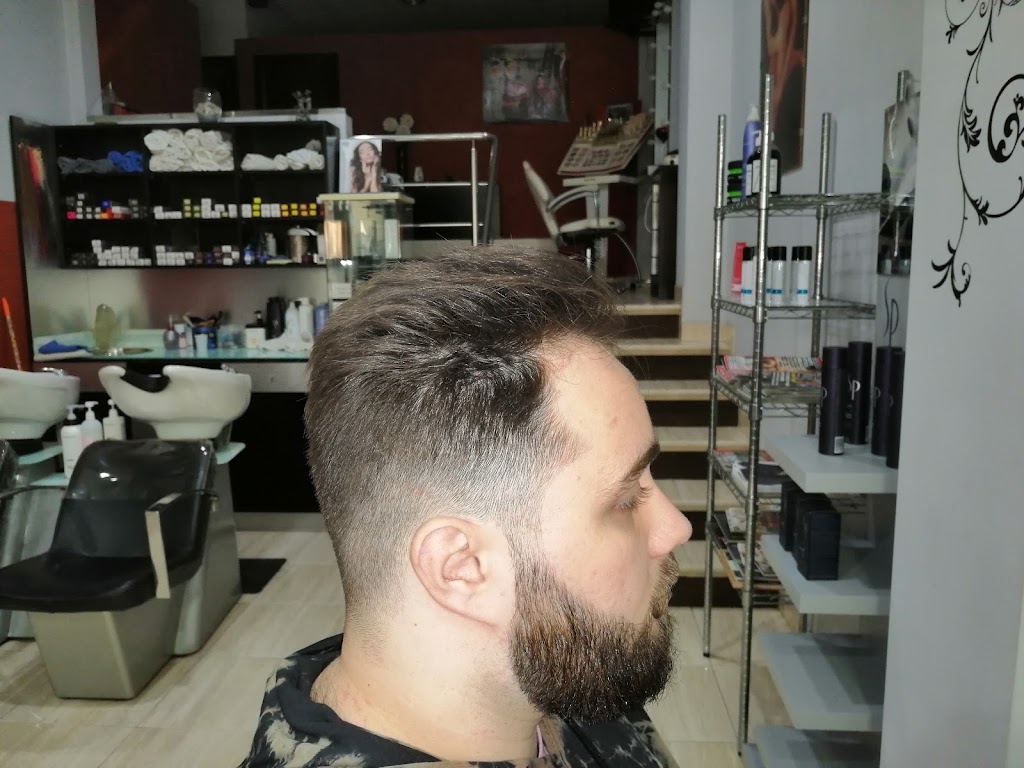 Dual peluqueria y barberia — Peinado