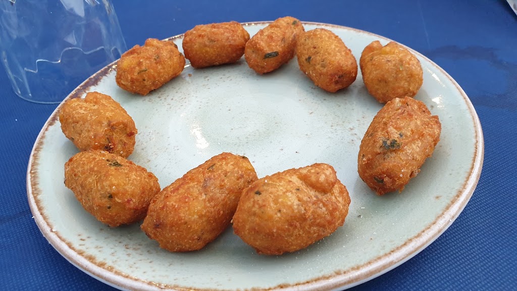 El Hogar del Pescador — Comida y bebida