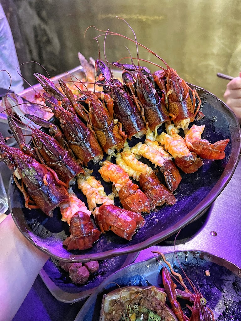 賣烤魚的。 的照片