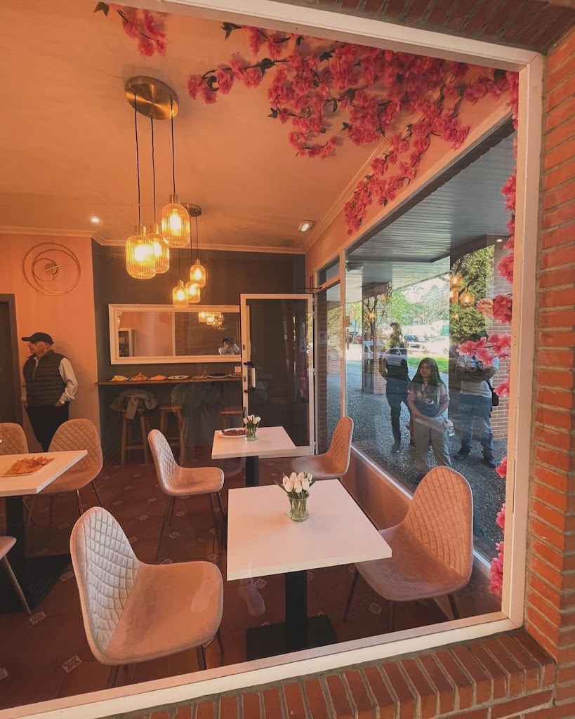 Cafe con Flores — Del propietario
