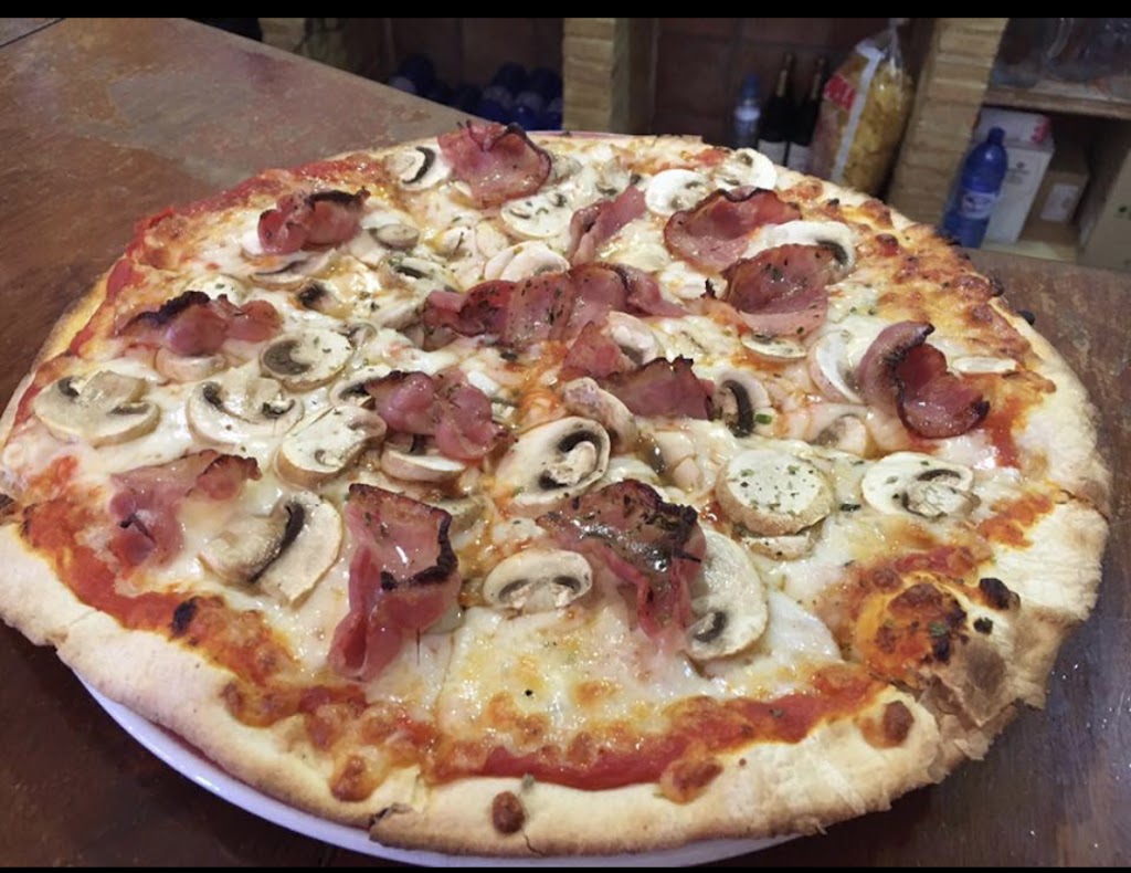 Restaurante Pizzeria Villa Toscana — Comida y bebida