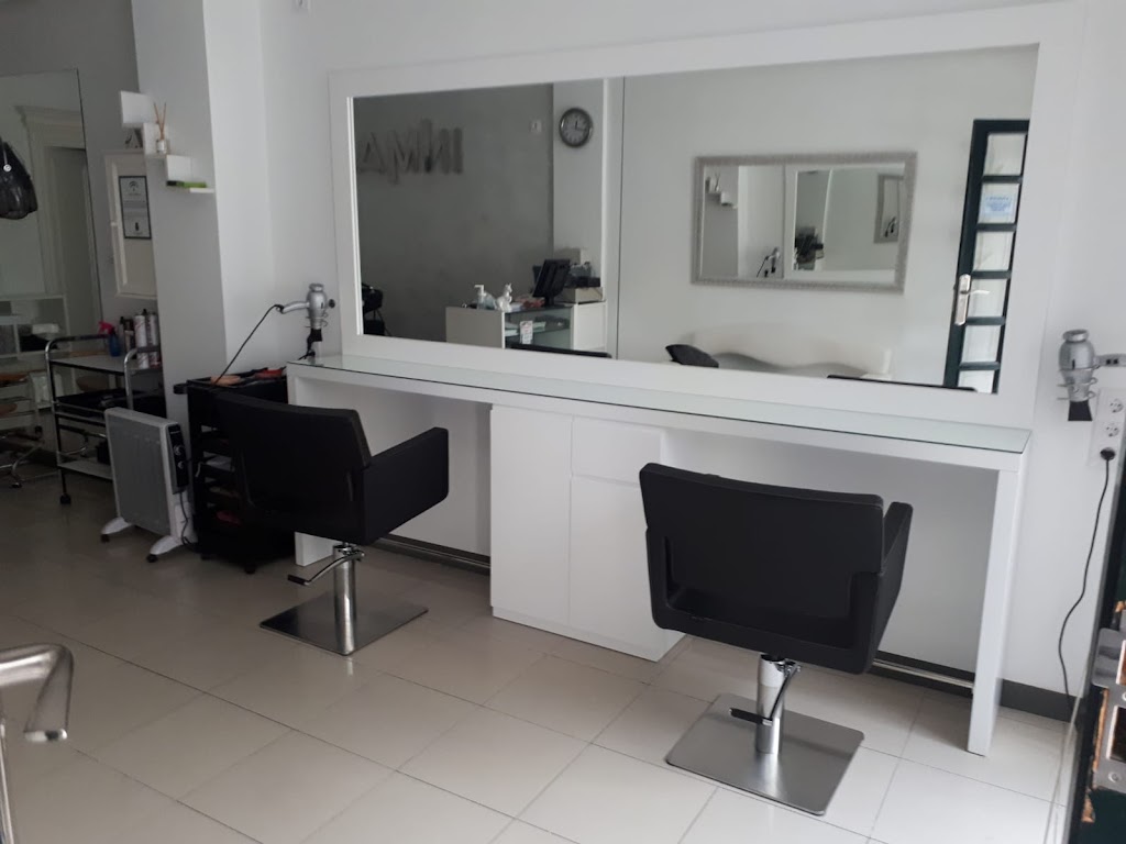 SALON DE PELUQUERIA INMA. — Interior