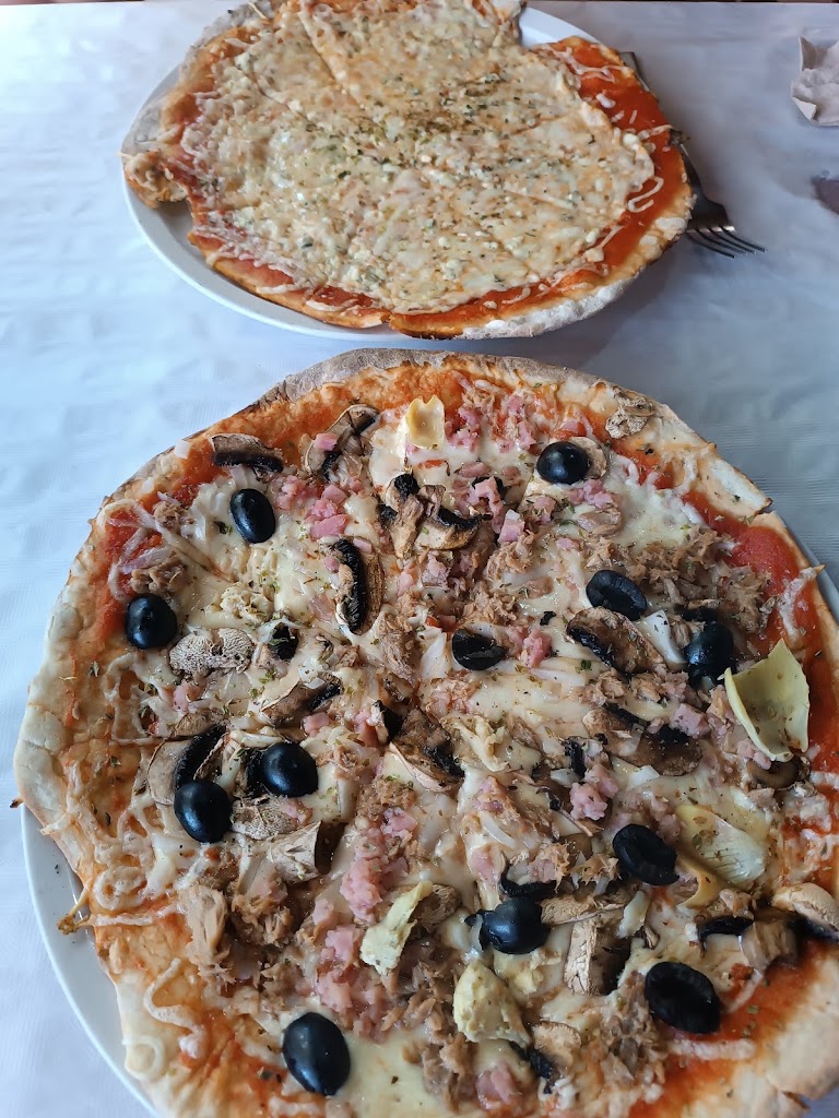 Restaurante Pizzeria"El Mirador" — Comida y bebida
