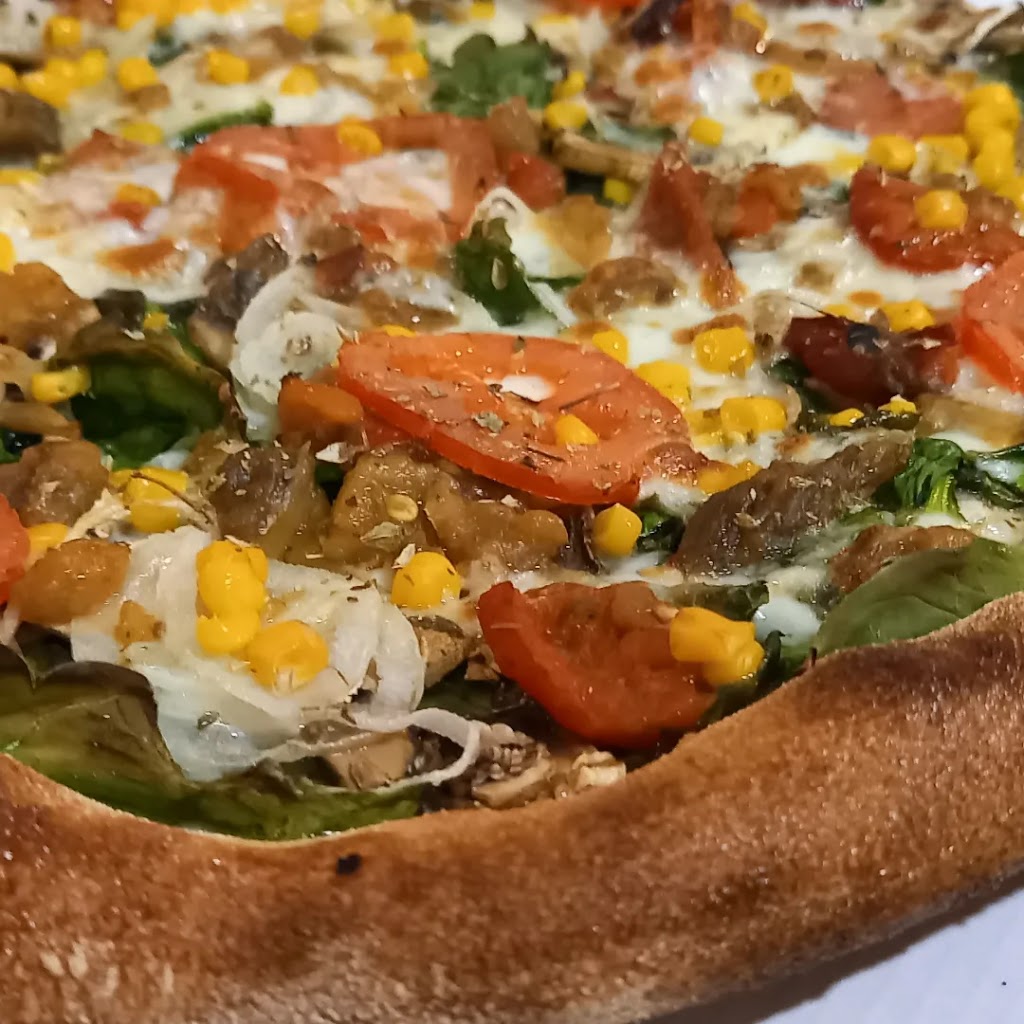 Pizzeria LA TORRE DE PIZZA LA RAPITA — Comida y bebida