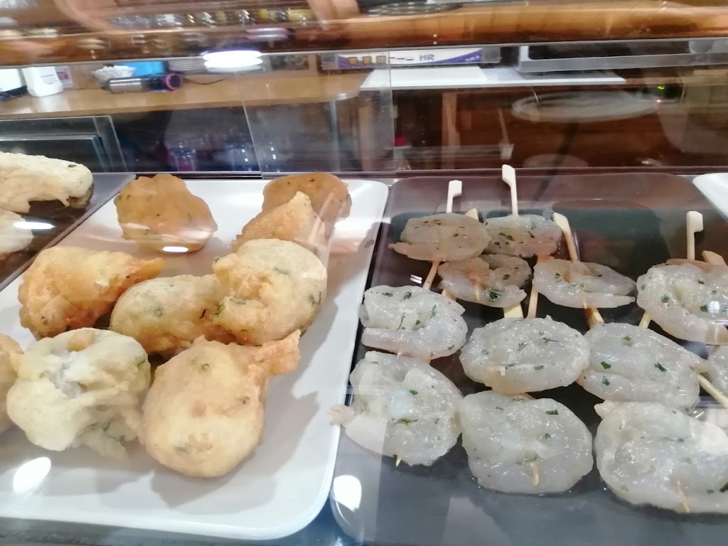 Bar del Barrio — Comida y bebida