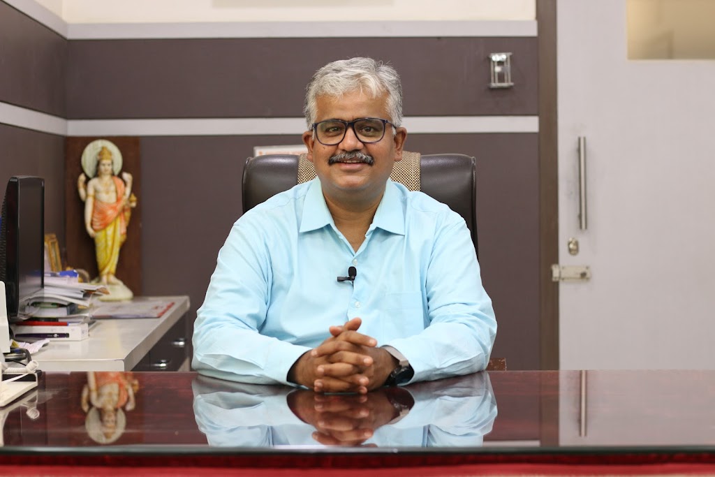 Dr. Dr Abhijit Pathak