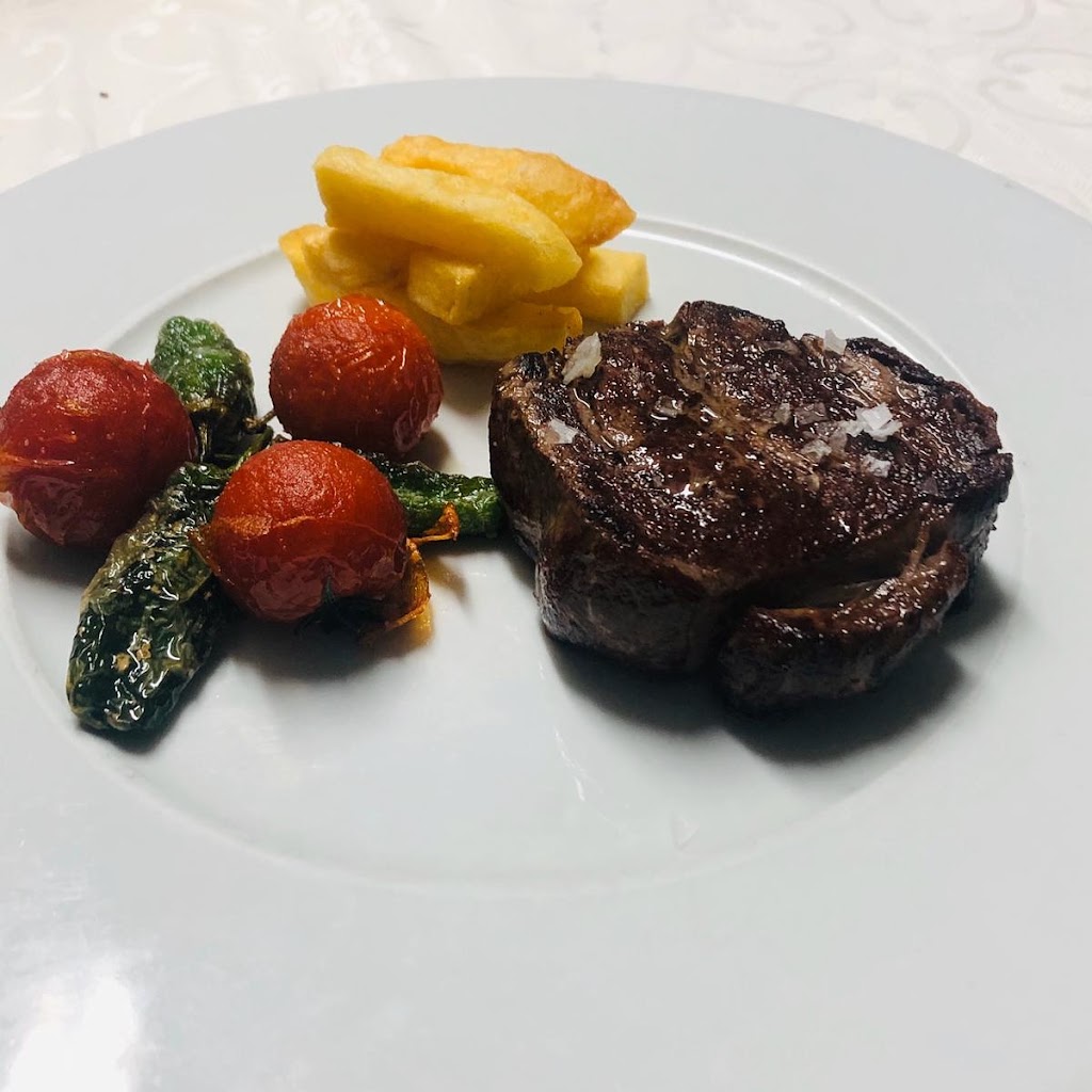 Parrilla Principe — Comida y bebida