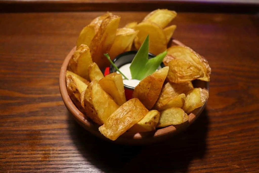 Bar Lautrec Cafeteria i Tapes — Comida y bebida