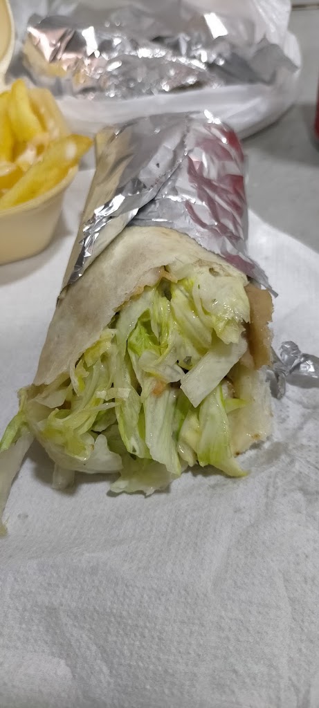 Pizzeria Manises — Comida y bebida