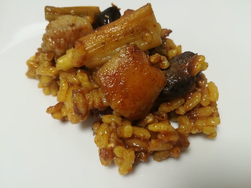 El sitio arroceria — Comida y bebida