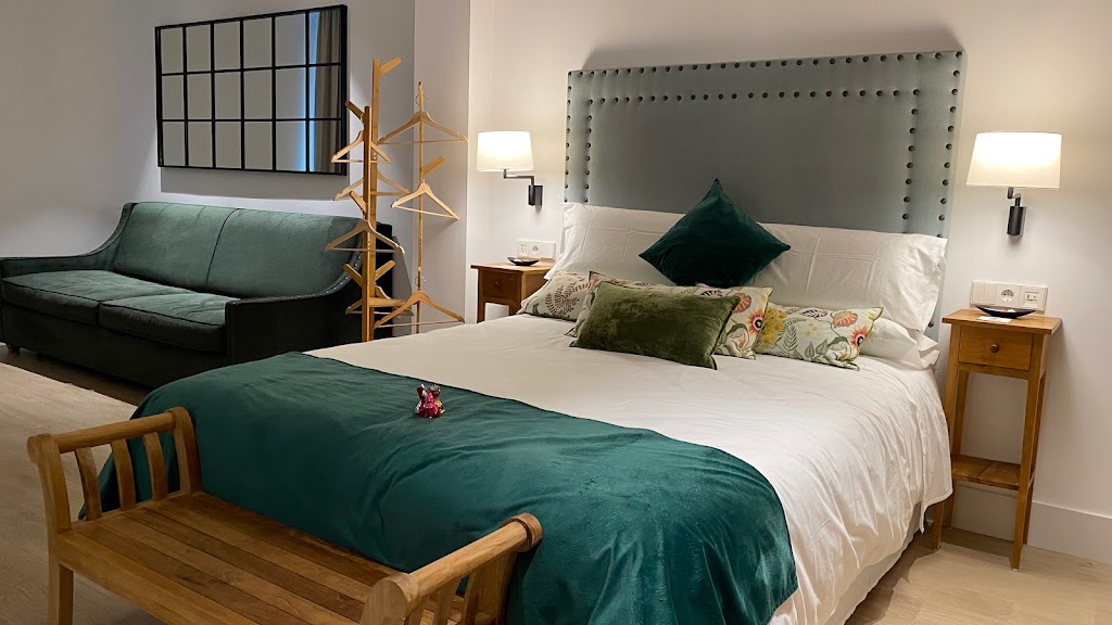 Apartamentos Turisticos La Plaza — Habitaciones