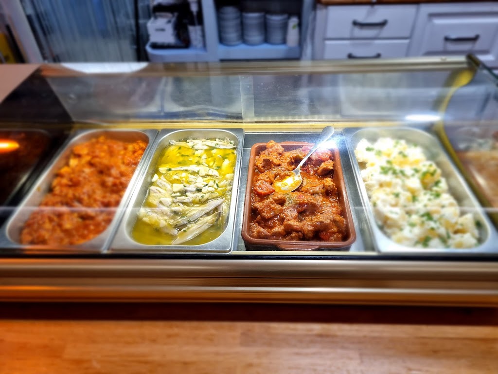 Veintitres Cafe Bar — Del propietario