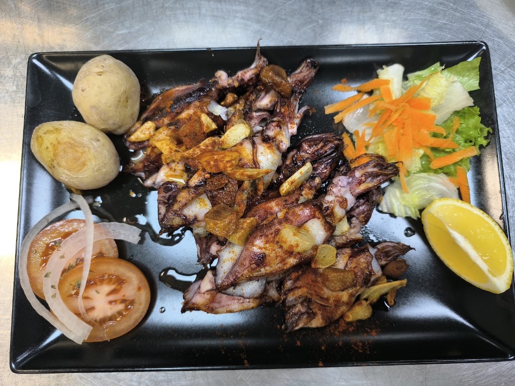 Iberica Restaurante — Comida y bebida