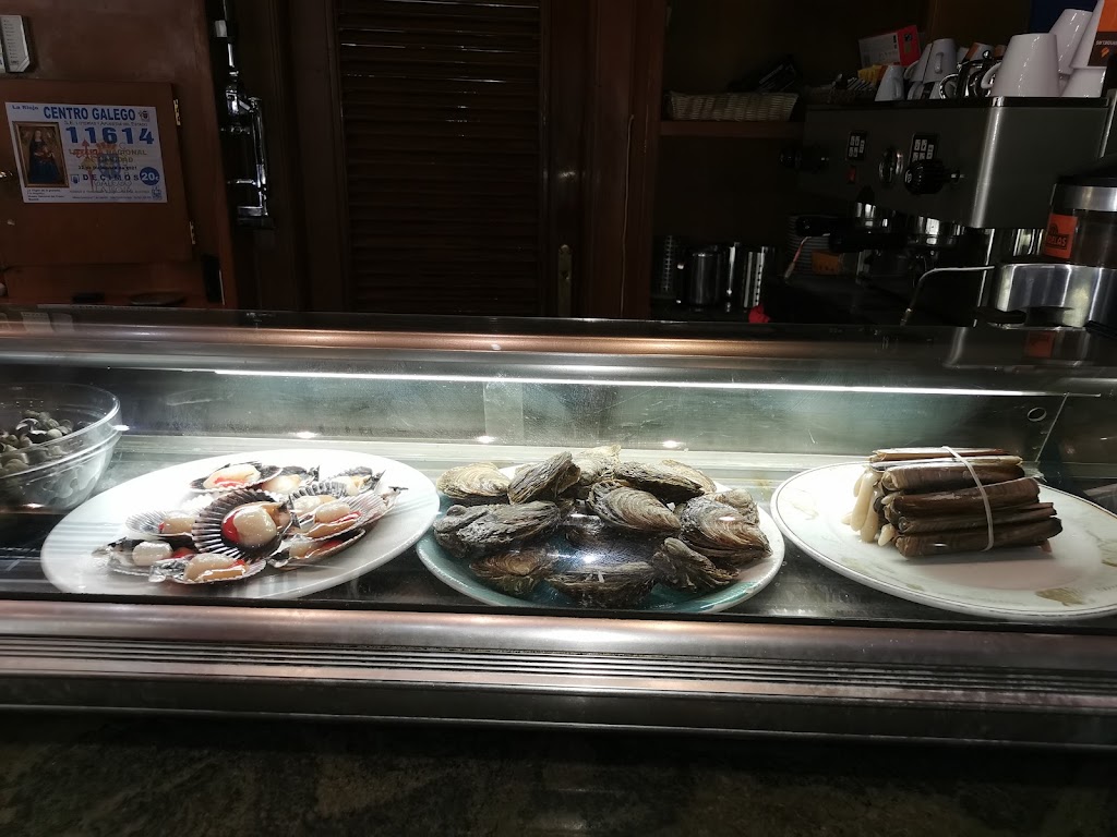 Restaurante Centro Gallego — Comida y bebida