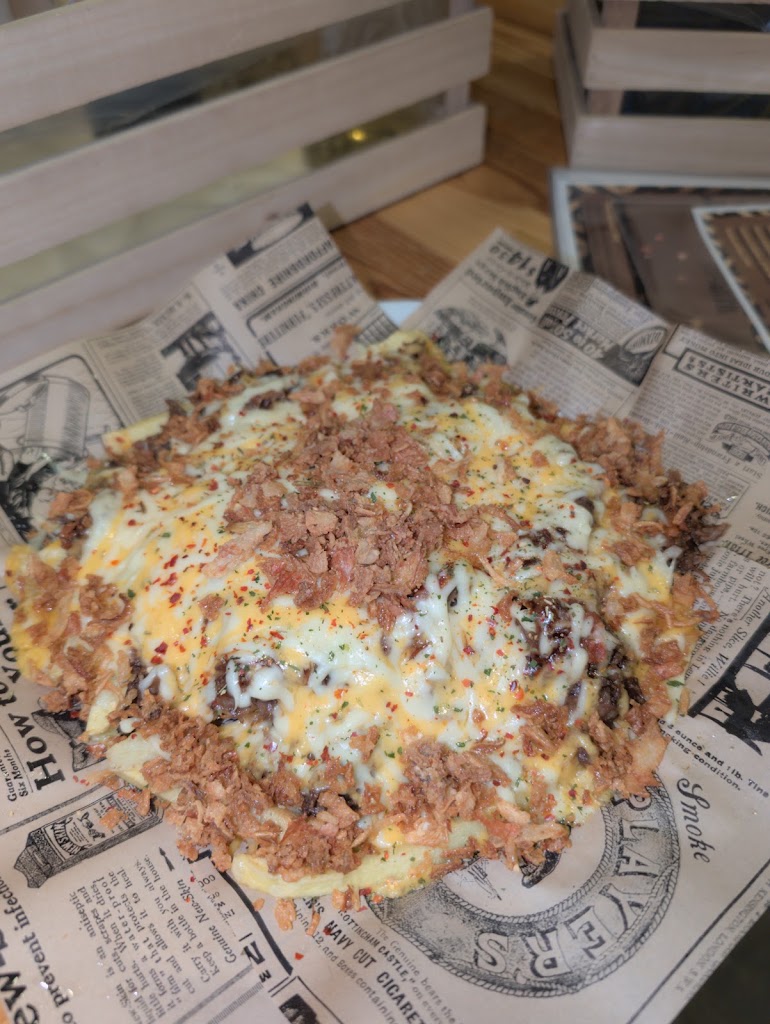 El Comboi Gastrobar — Papas fritas con queso
