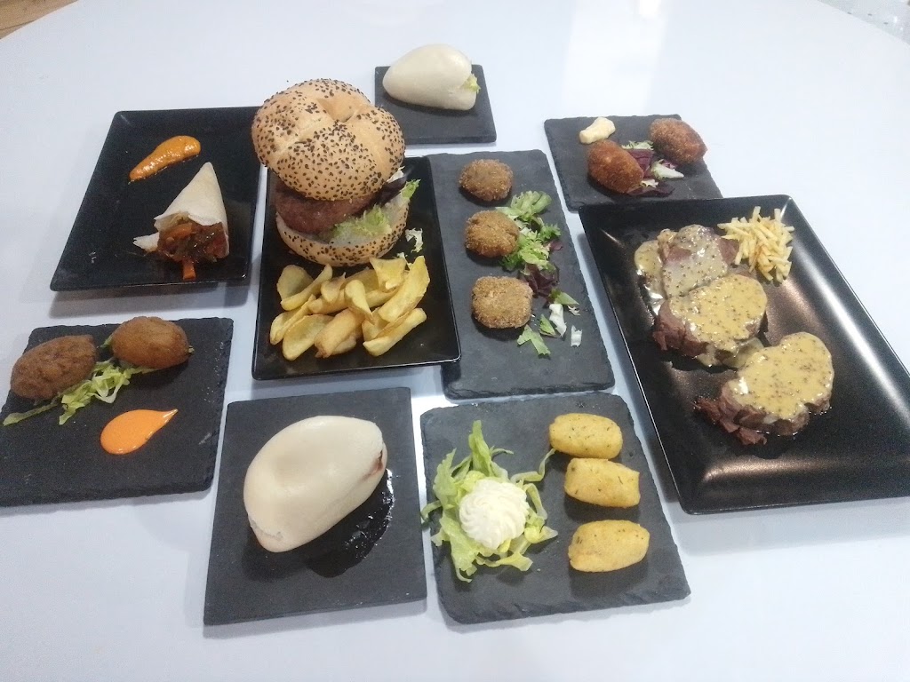 Quico Cerveceria — Comida y bebida