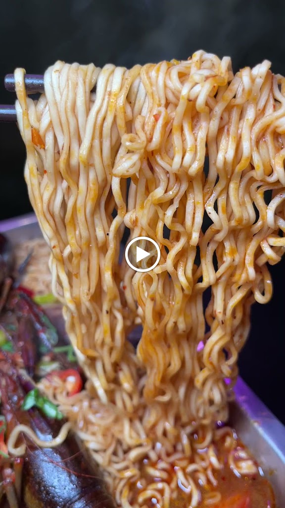 賣烤魚的。 的照片