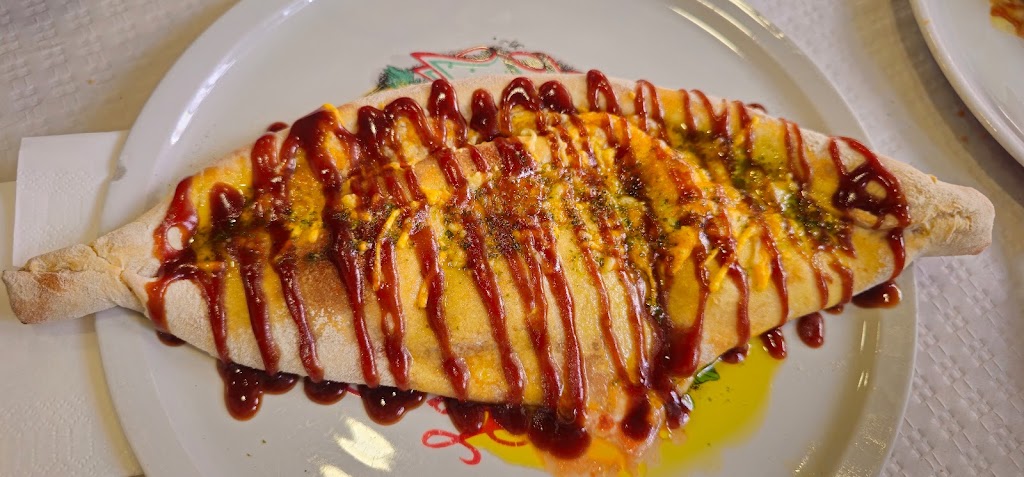 Restaurante Pizzeria Michelangelo — Comida y bebida