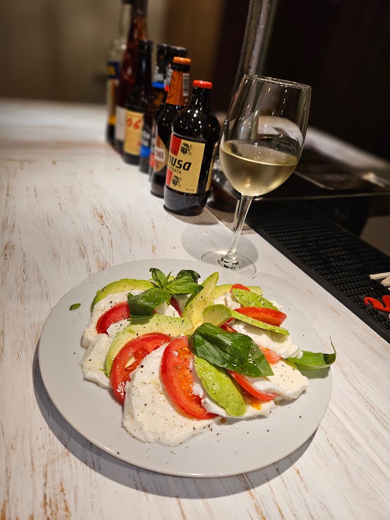 Da Dina Restaurante y pizzeria — Comida y bebida