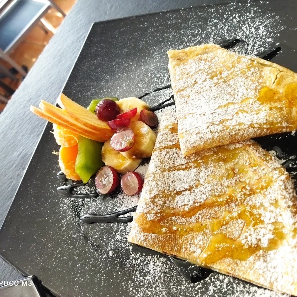 Granadilla Cafe — Comida y bebida