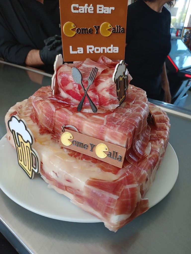 Come y Calla — Comida y bebida