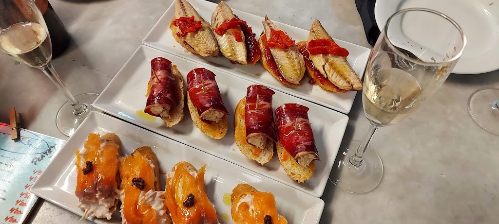 Taverna Tatxin Tatxin — Comida y bebida