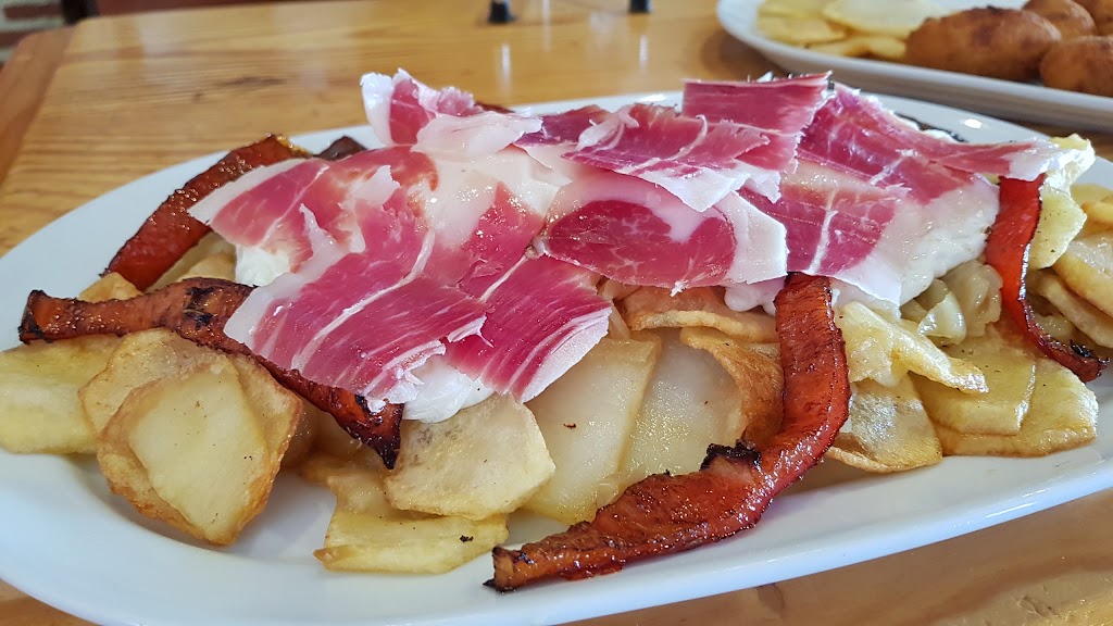 Meson Casa Eugenio — Comida y bebida