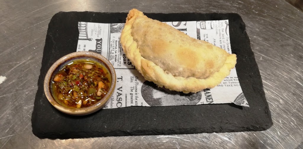 Bar restaurante La Barrica de Villa — Empanada