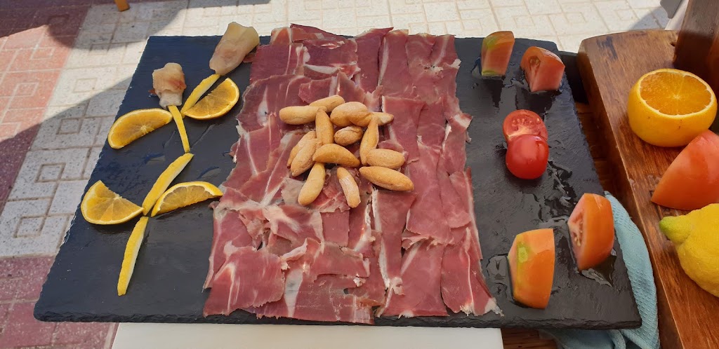 Restaurante El Raco Playa — Comida y bebida