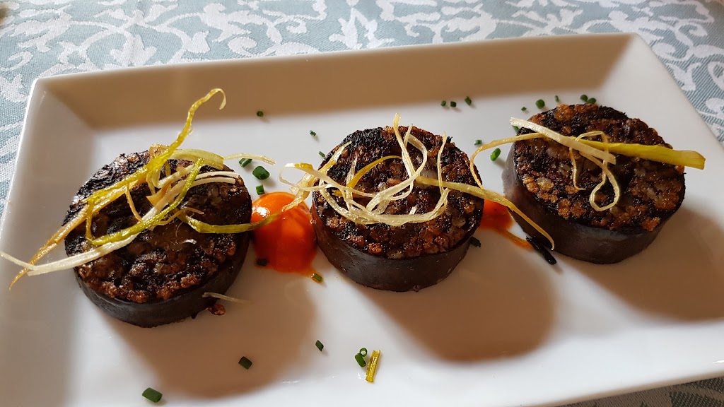 Restaurante La Almazara de Carmona — Comida y bebida