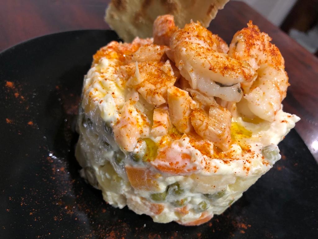 El vi de deu — Comida y bebida