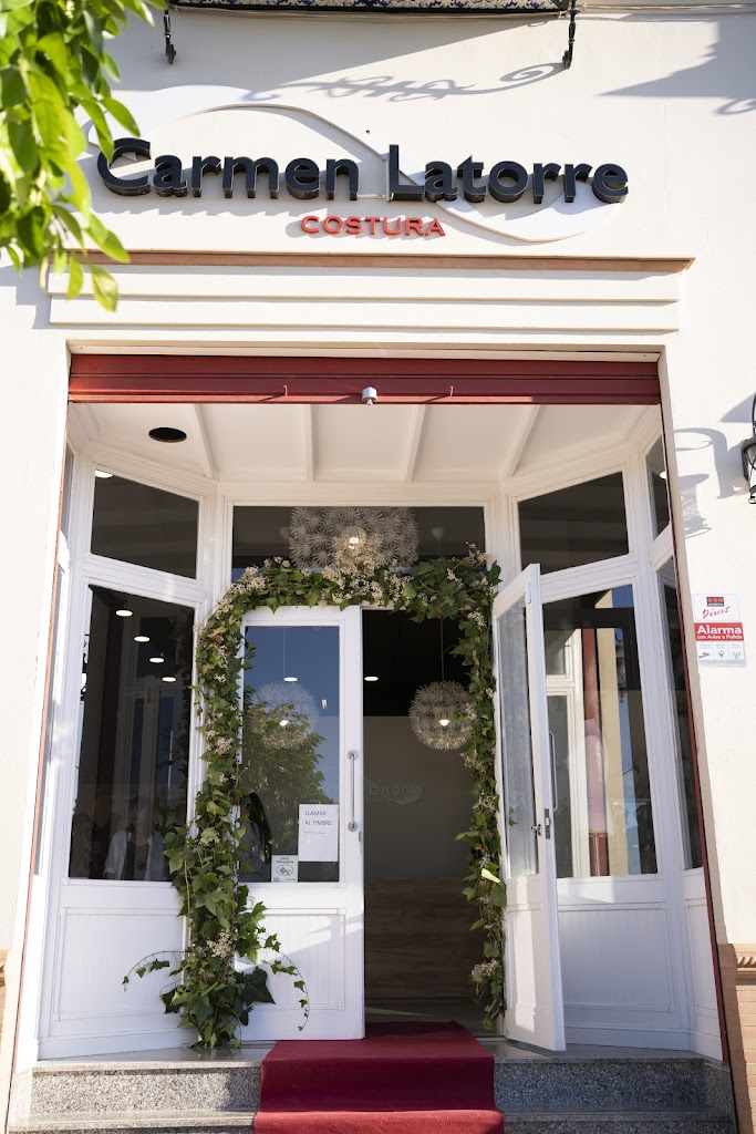 Carmen Latorre - Novias y Moda Flamenca