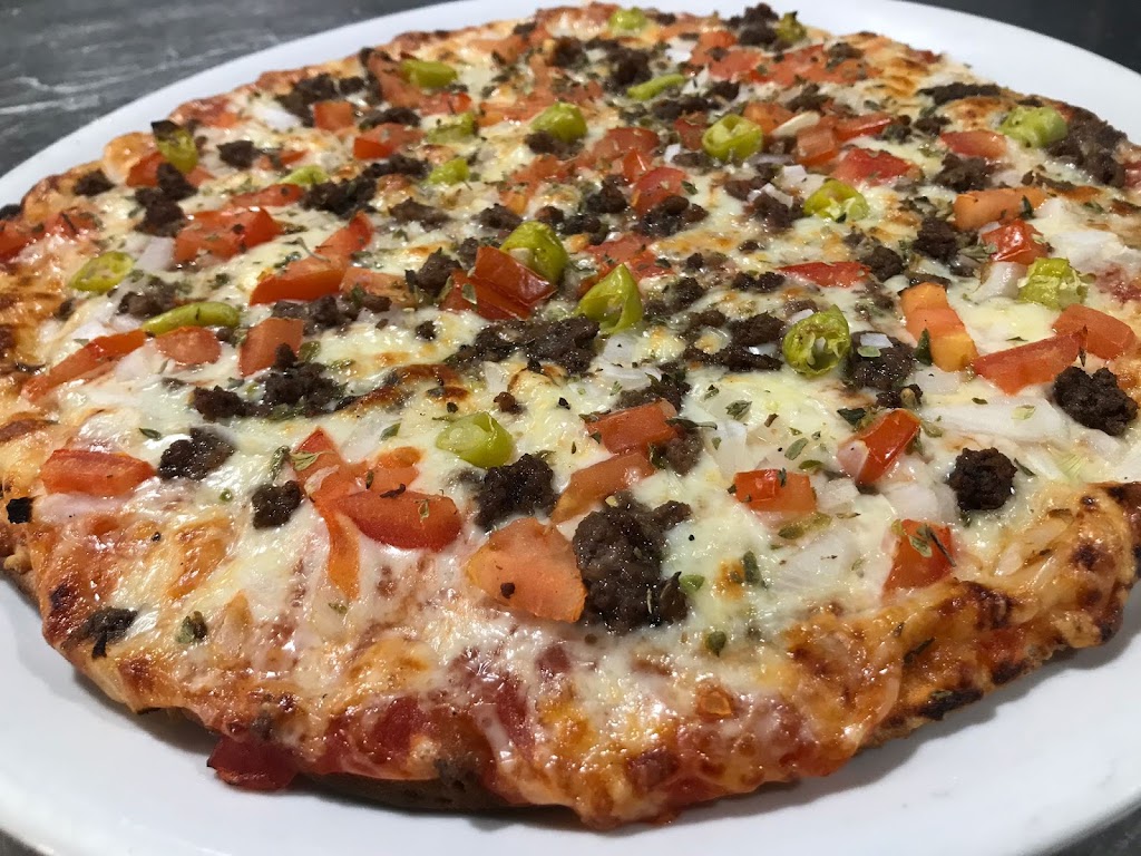 Restaurante Pizzeria Jimenez — Comida y bebida