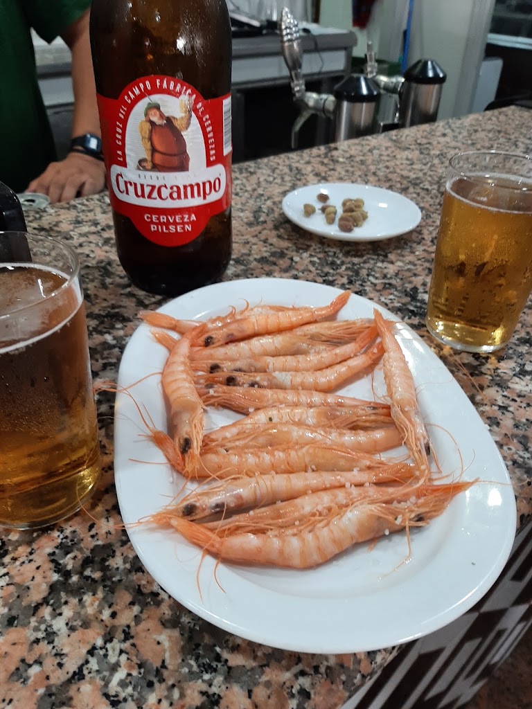 Bodega Paquito — Comida y bebida