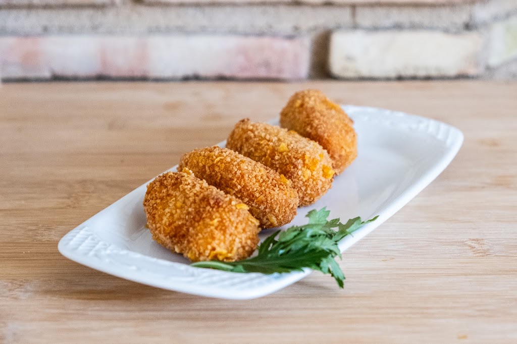 Pizzeria ROSTICCERIA ITALIANA (Al Bacio) — Comida y bebida