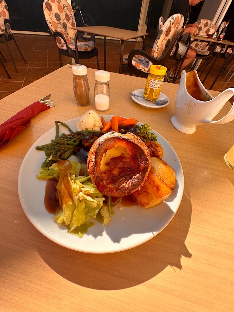 The Watering Hole — Comida y bebida