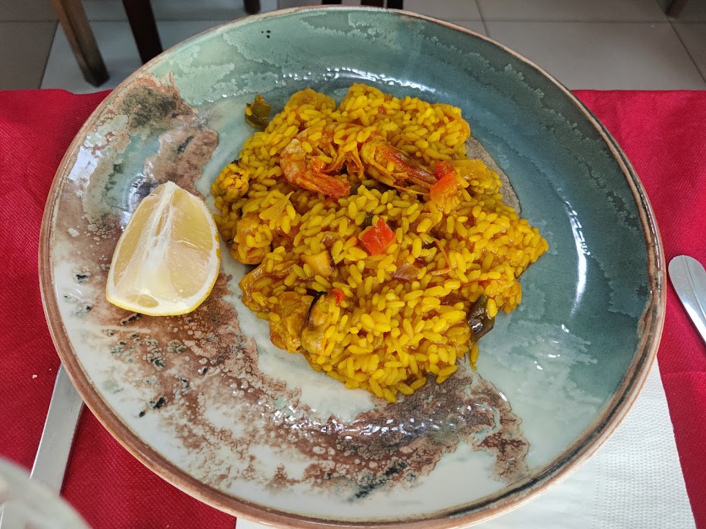 Asador Puerta de Alcala — Comida y bebida