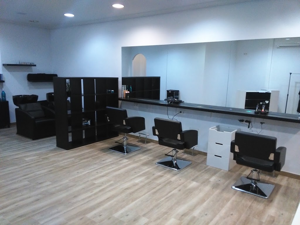 ARYES Peluqueros — Interior