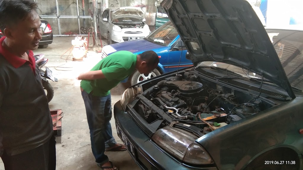 Bengkel Mobil Tiara Motor.
