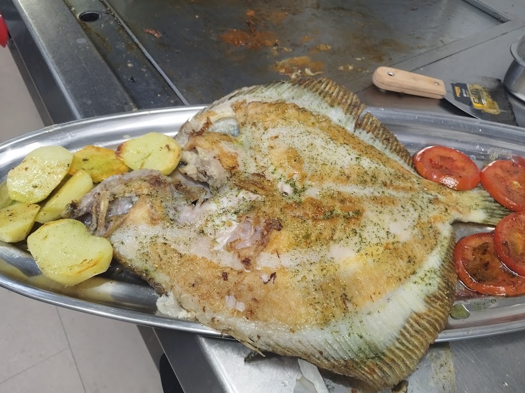 Sidreria El Chigre — Comida y bebida