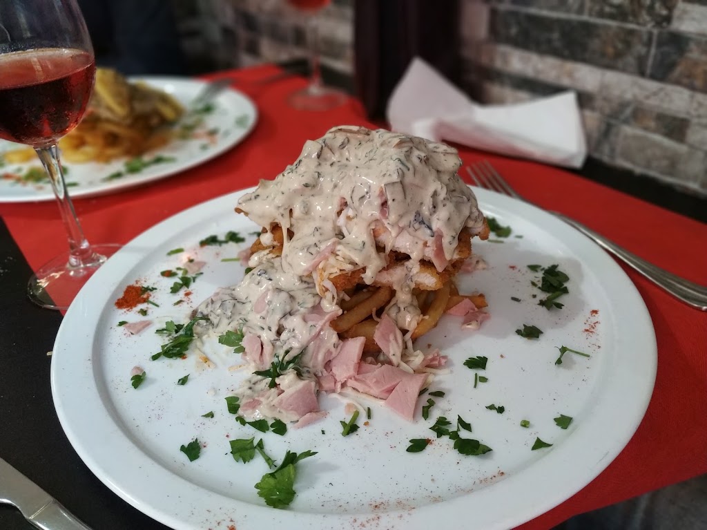 El Fogal Pizzeria Restaurante — Comida y bebida
