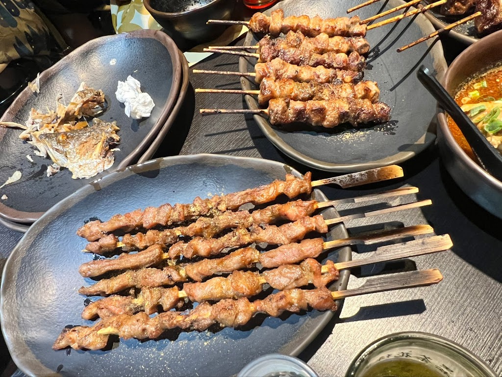 賣烤魚的。 的照片