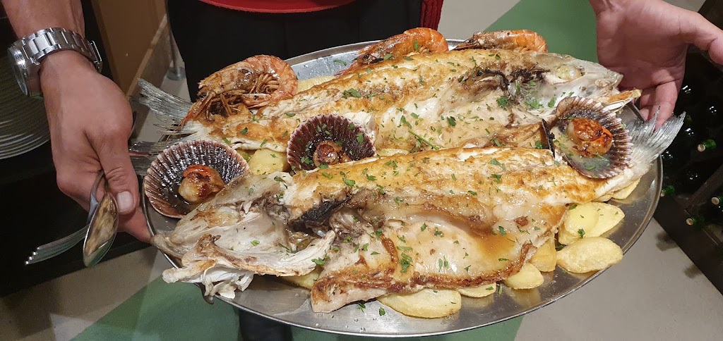 Parrilla Sidreria Muno Poniente — Comida y bebida