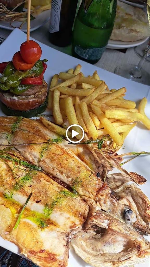 Restaurante La Cala — Videos