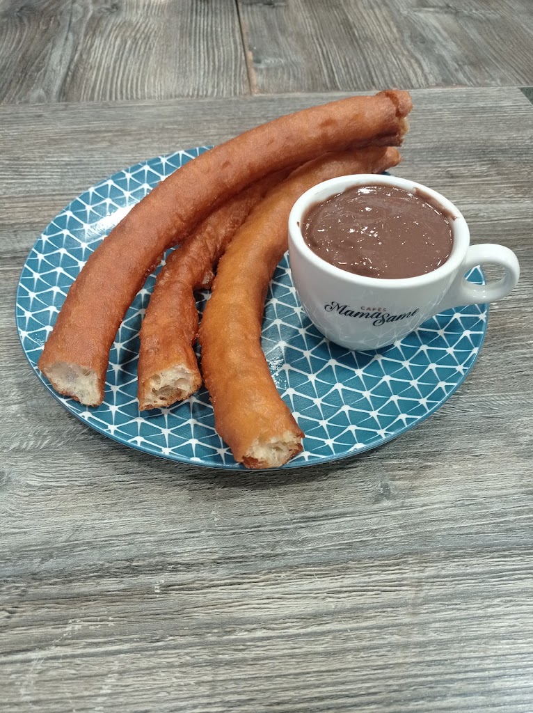 Xurreria Xocolateria Bar Quiniela — Comida y bebida