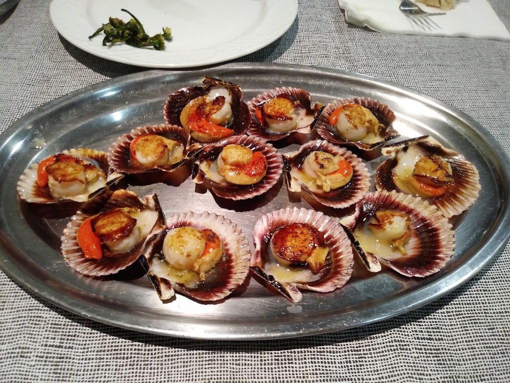 O Pucheiro — Comida y bebida