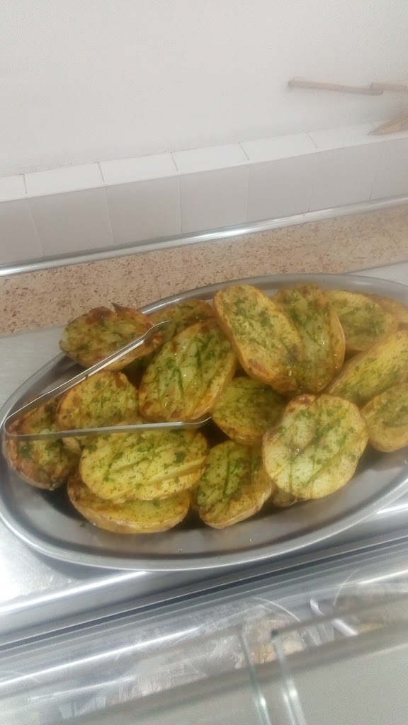 Loli Menjars per Emportar — Comida y bebida