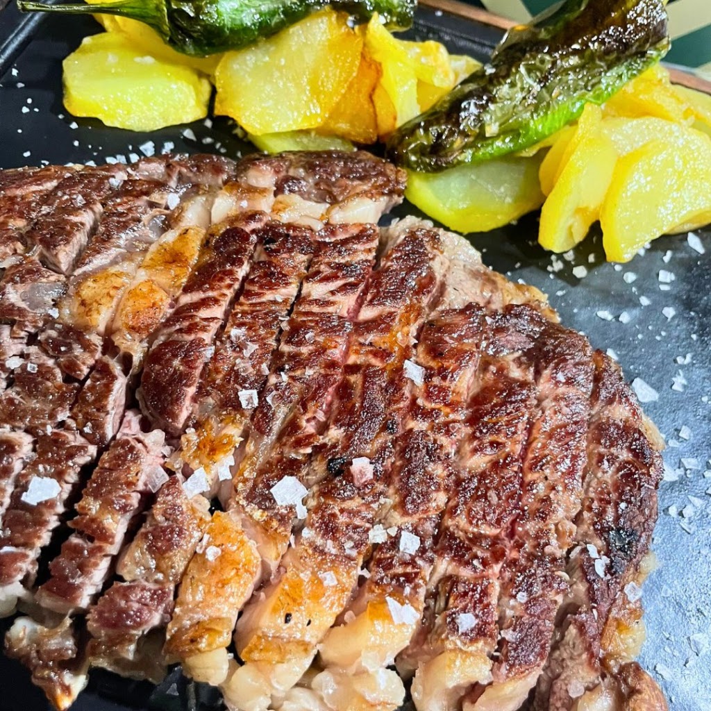 As de Oros Orihuela Restaurante — Comida y bebida