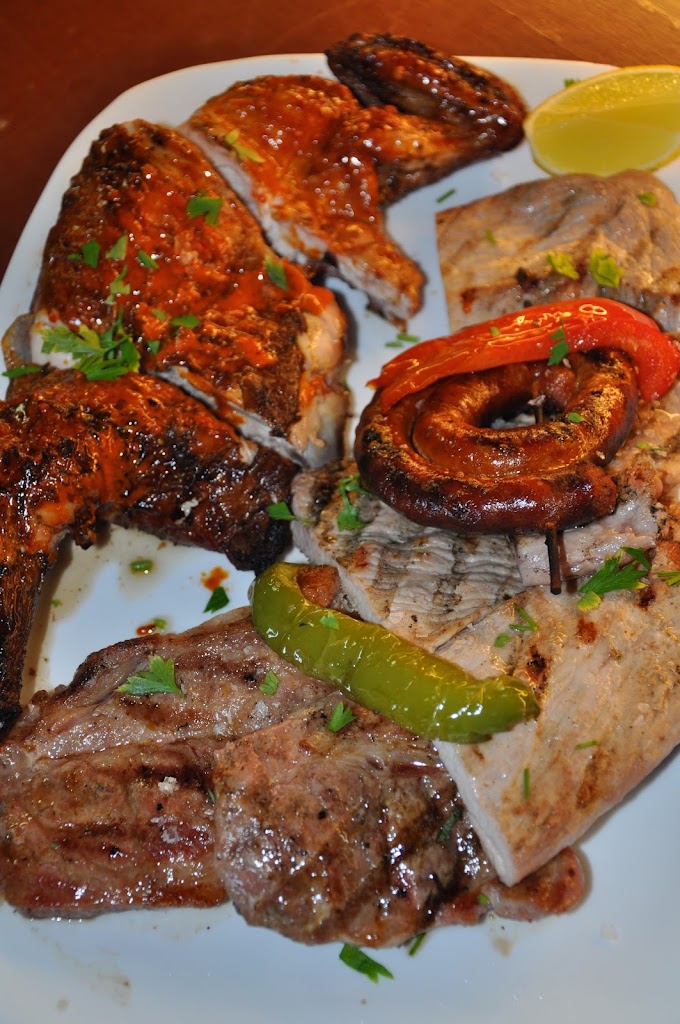 Guachinche La Parrilla — Comida y bebida