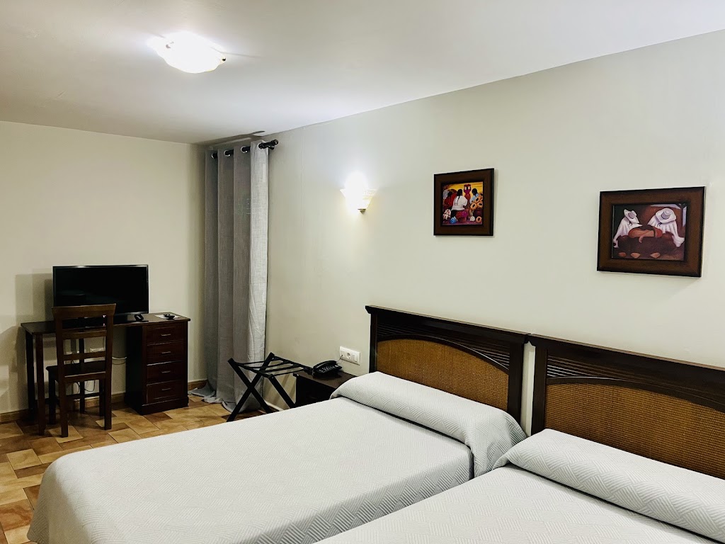 Hotel Cervantes — Habitaciones